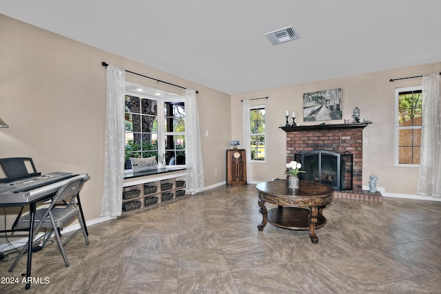 living room featuring a fireplace