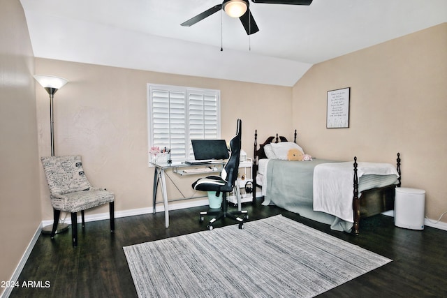 bedroom with ceiling fan, dark wood-type flooring, and vaulted ceiling