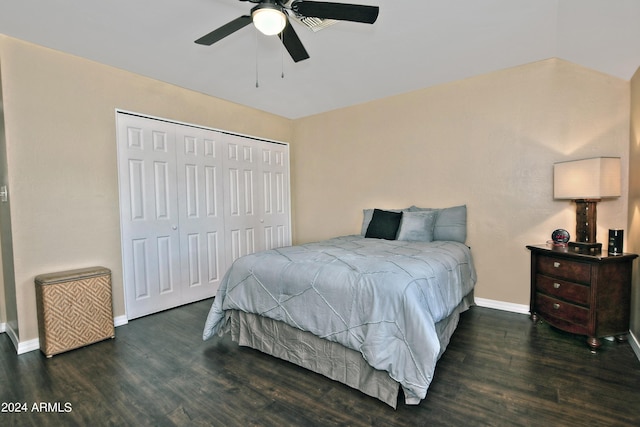 bedroom with ceiling fan, a closet, and dark hardwood / wood-style floors