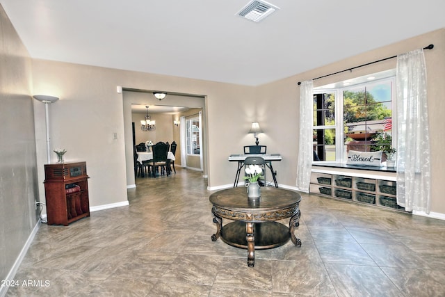 interior space featuring a notable chandelier