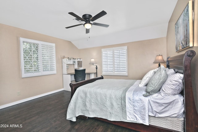 bedroom with ceiling fan, dark hardwood / wood-style flooring, and lofted ceiling