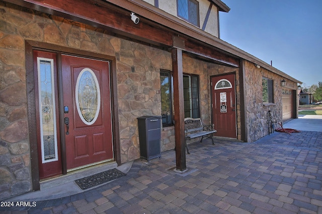 entrance to property with a garage