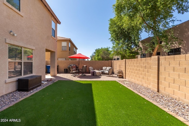 view of yard with a patio area