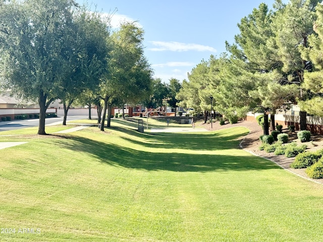 surrounding community featuring a lawn