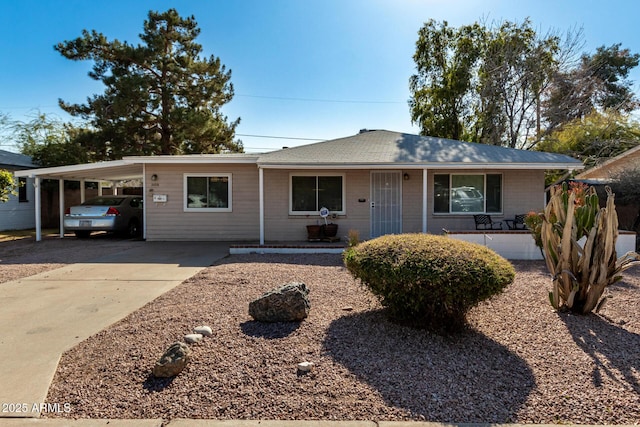 single story home featuring a carport and covered porch