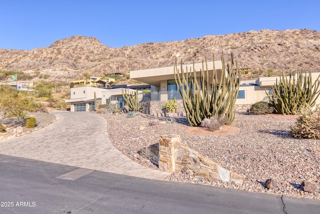 adobe home with a mountain view