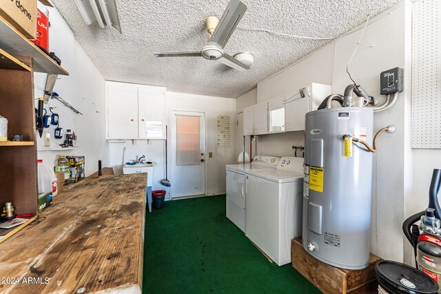 interior space with ceiling fan, a textured ceiling, dark colored carpet, washing machine and dryer, and water heater