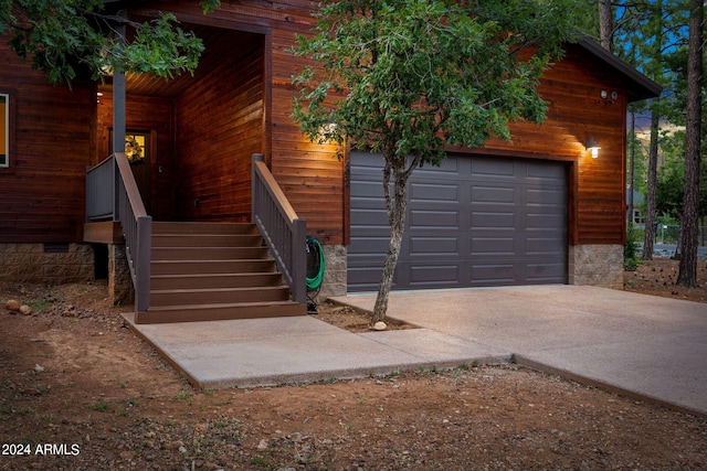 exterior space with a garage