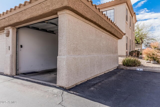 9253 N Firebrick Dr Unit 117, Fountain Hills, AZ 85268 - view of property exterior with stucco siding and a tile roof