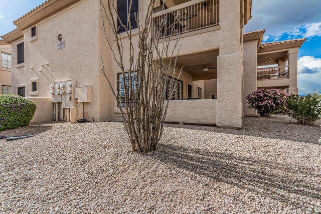 9253 N Firebrick Dr Unit 117, Fountain Hills, AZ 85268 - exterior space featuring ceiling fan, a balcony, and stucco siding