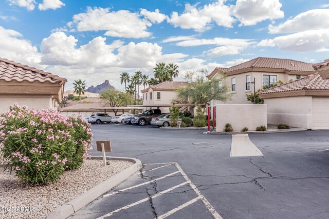 9253 N Firebrick Dr Unit 117, Fountain Hills, AZ 85268 - partially covered parking lot with a residential view