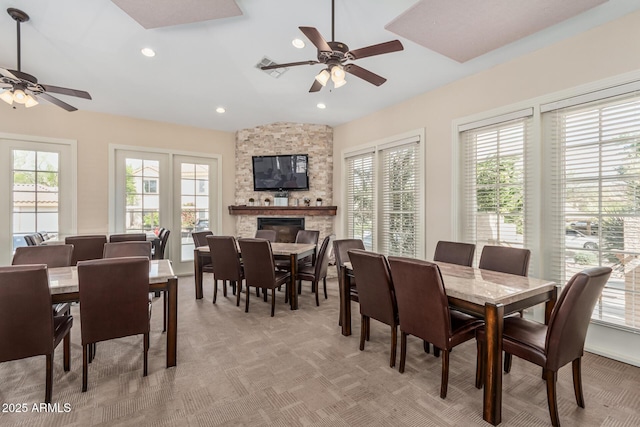 9253 N Firebrick Dr Unit 117, Fountain Hills, AZ 85268 - dining room featuring a healthy amount of sunlight, a ceiling fan, and light carpet