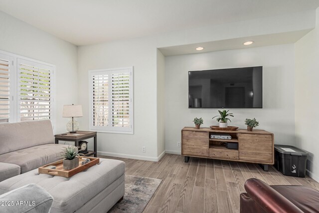 9253 N Firebrick Dr Unit 117, Fountain Hills, AZ 85268 - living area with recessed lighting, wood finished floors, and baseboards