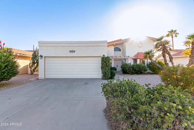 view of front of property featuring a garage