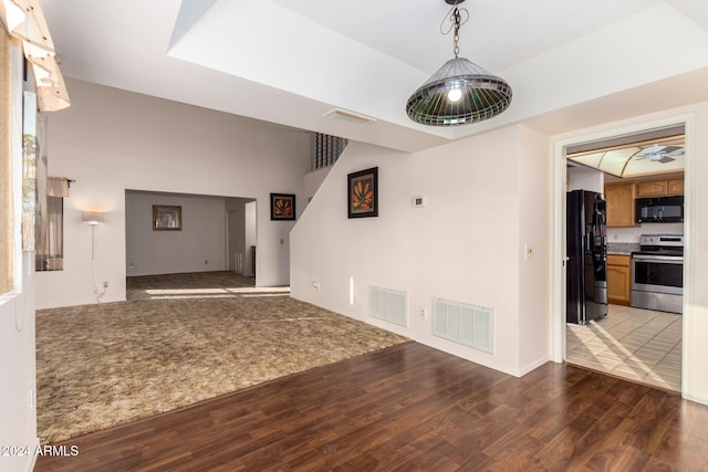 unfurnished living room featuring light hardwood / wood-style floors