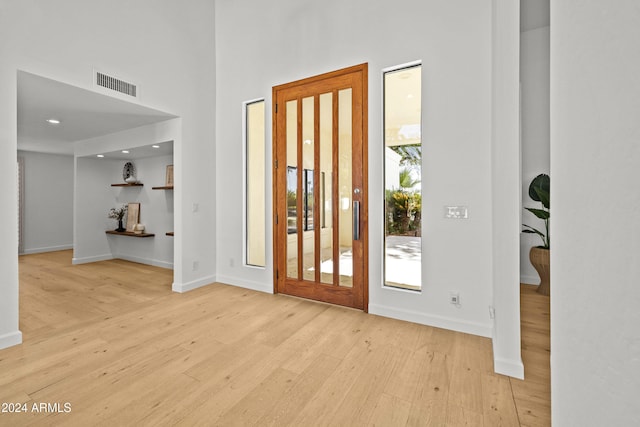 entrance foyer featuring light hardwood / wood-style floors