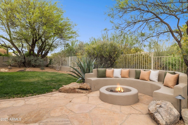 view of patio with a fenced backyard and an outdoor fire pit