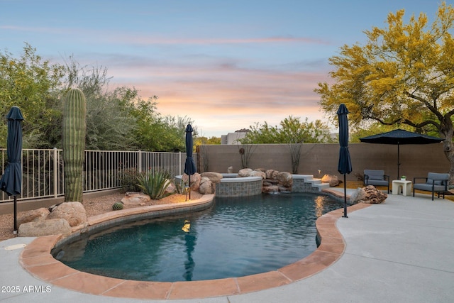 view of pool with a fenced backyard, a fenced in pool, and a patio area