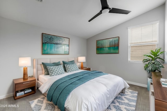 bedroom featuring ceiling fan and vaulted ceiling