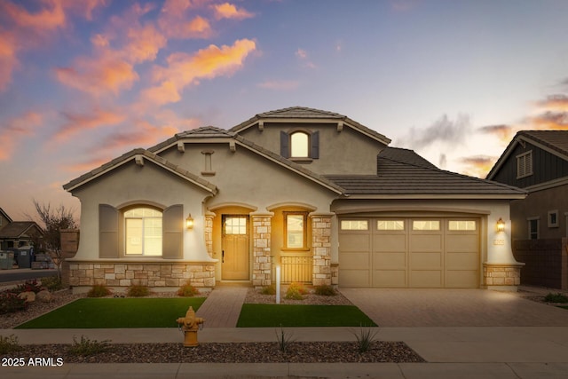 view of front of home with a garage