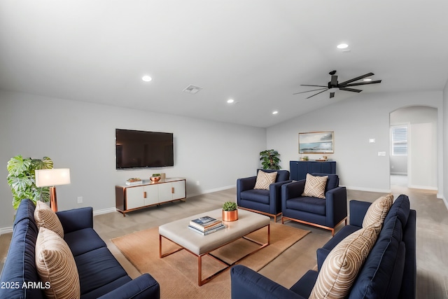 living room with vaulted ceiling and ceiling fan