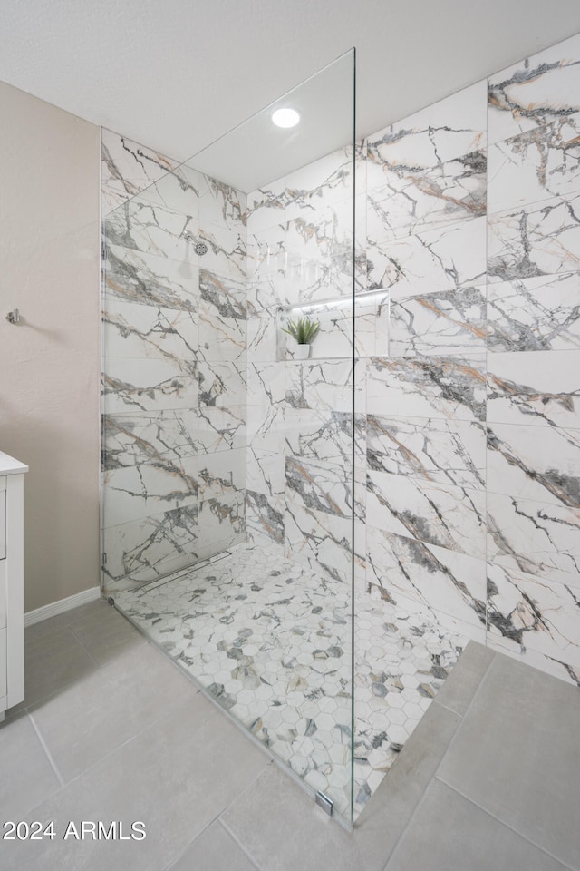 bathroom featuring tile floors and vanity