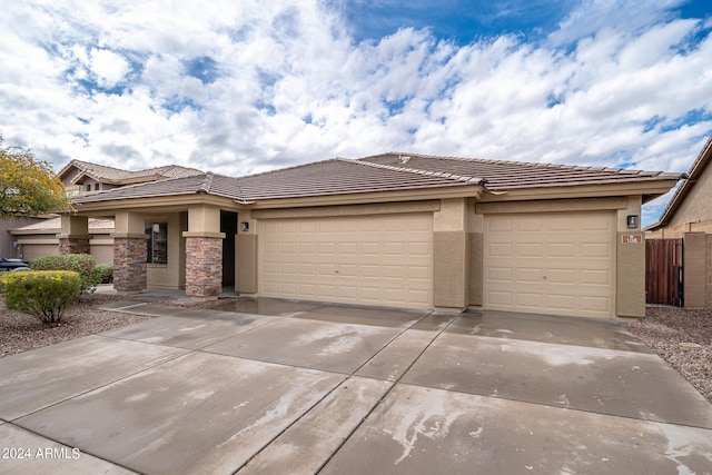 view of front of property featuring a garage