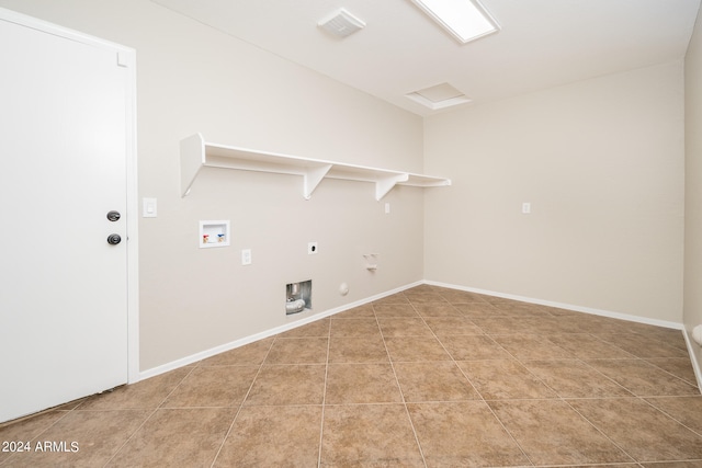 washroom featuring washer hookup, hookup for a gas dryer, electric dryer hookup, and light tile floors