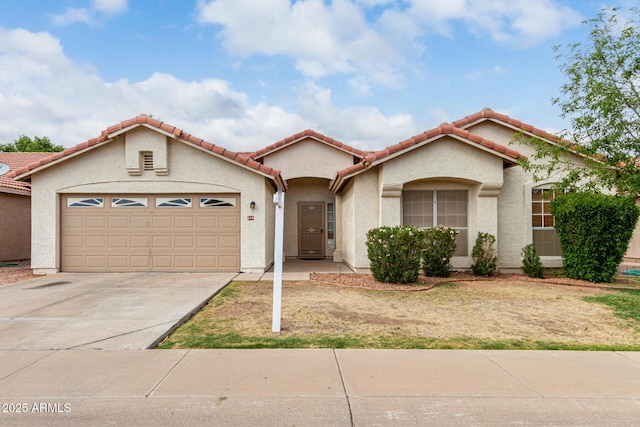 510 W Amoroso Dr, Gilbert, AZ 85233 - mediterranean / spanish home with a garage, concrete driveway, stucco siding, and a tiled roof