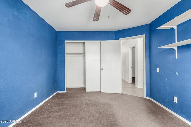 510 W Amoroso Dr, Gilbert, AZ 85233 - unfurnished bedroom with carpet, a closet, baseboards, and a ceiling fan