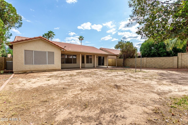510 W Amoroso Dr, Gilbert, AZ 85233 - rear view of property with a tiled roof, a fenced backyard, and stucco siding