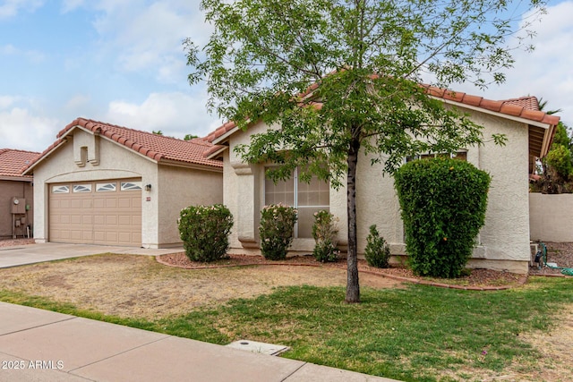 510 W Amoroso Dr, Gilbert, AZ 85233 - mediterranean / spanish-style house with a tile roof, a garage, stucco siding, and concrete driveway