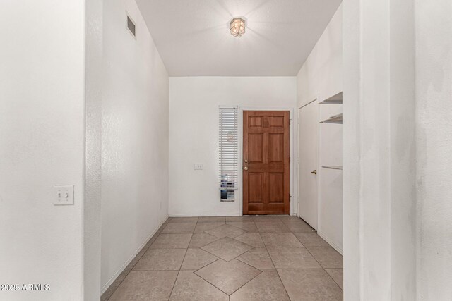 510 W Amoroso Dr, Gilbert, AZ 85233 - hall featuring baseboards and light tile patterned floors