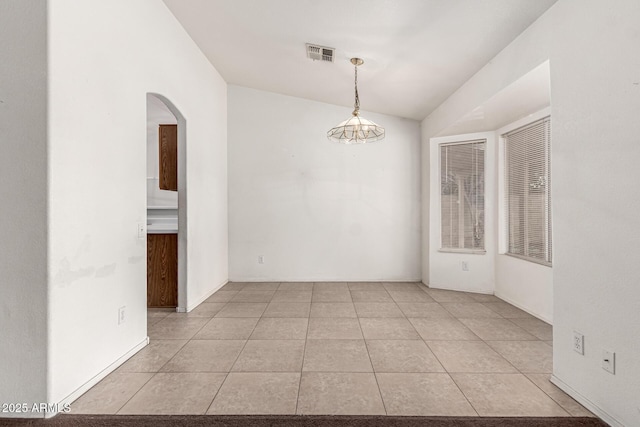 510 W Amoroso Dr, Gilbert, AZ 85233 - unfurnished room with arched walkways and light tile patterned flooring