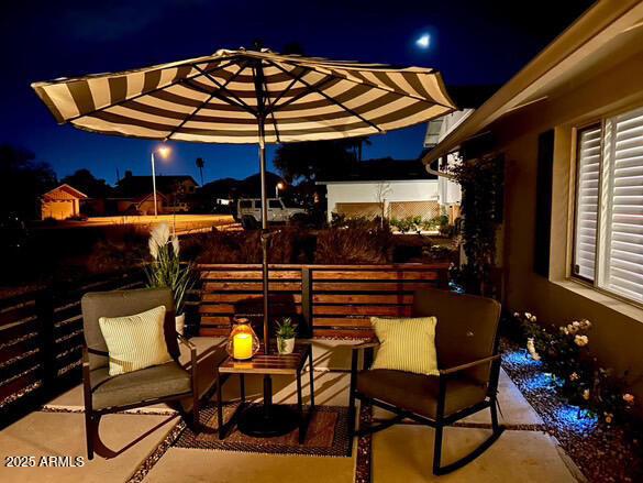 view of patio at twilight