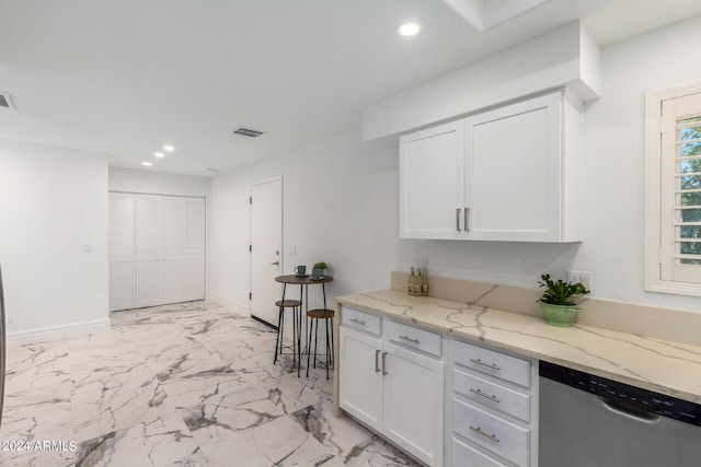 kitchen featuring marble finish floor, recessed lighting, visible vents, stainless steel dishwasher, and white cabinetry