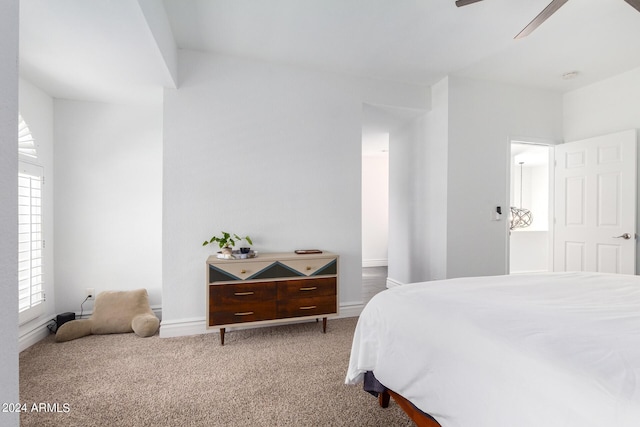 bedroom featuring carpet floors, a ceiling fan, and baseboards