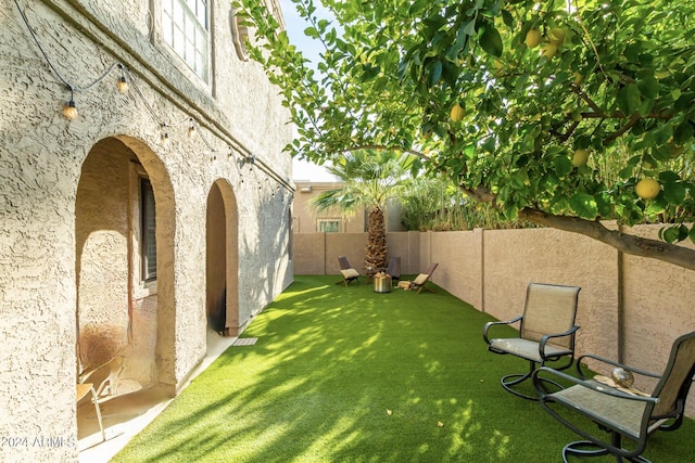 view of yard featuring fence