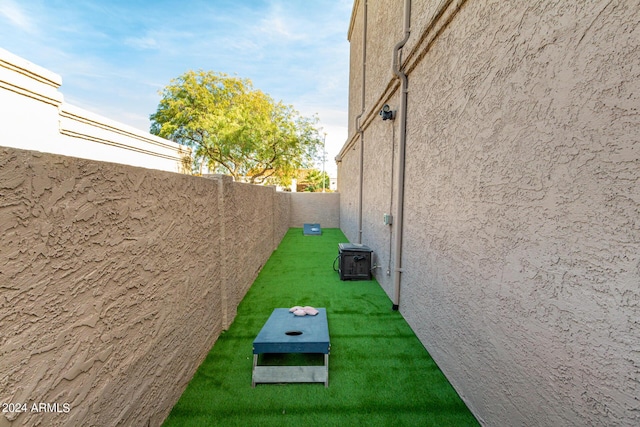 view of yard featuring a fenced backyard and cooling unit