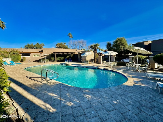 community pool with a patio