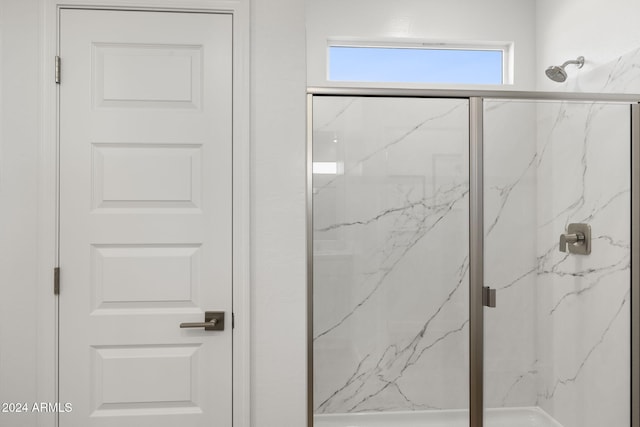 bathroom with an enclosed shower