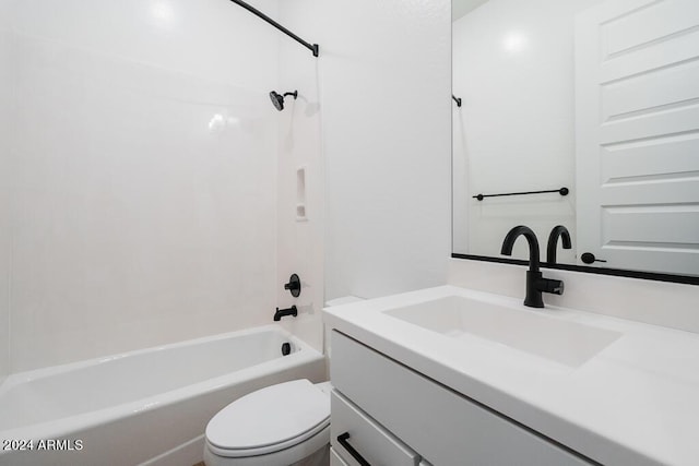 full bathroom featuring tub / shower combination, toilet, and vanity