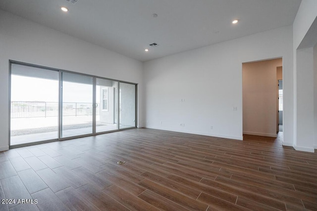 empty room featuring dark hardwood / wood-style floors