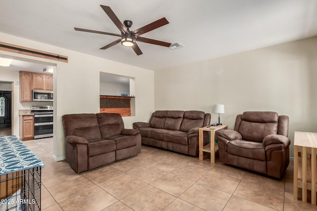 538 E Estevan Ave, Apache Junction, AZ 85119 - living area featuring ceiling fan and light tile patterned flooring