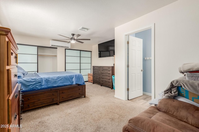 538 E Estevan Ave, Apache Junction, AZ 85119 - bedroom with a wall mounted air conditioner, carpet floors, and ceiling fan