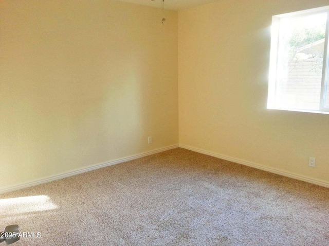 538 E Estevan Ave, Apache Junction, AZ 85119 - spare room featuring carpet and baseboards