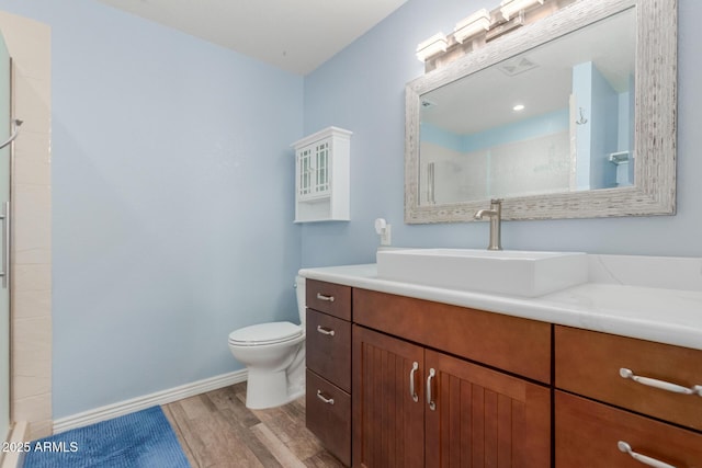 538 E Estevan Ave, Apache Junction, AZ 85119 - bathroom featuring wood finished floors, vanity, and an enclosed shower