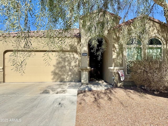 view of front of property with a garage