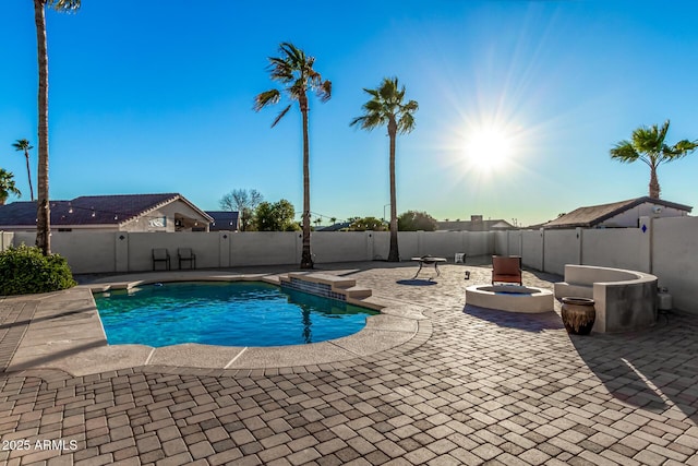 9169 W Ludlow Dr W, Peoria, AZ 85381 - view of pool featuring a fenced backyard, an outdoor fire pit, and a patio area