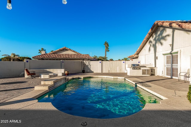 9169 W Ludlow Dr W, Peoria, AZ 85381 - view of pool featuring a patio, a fenced backyard, grilling area, a fenced in pool, and area for grilling